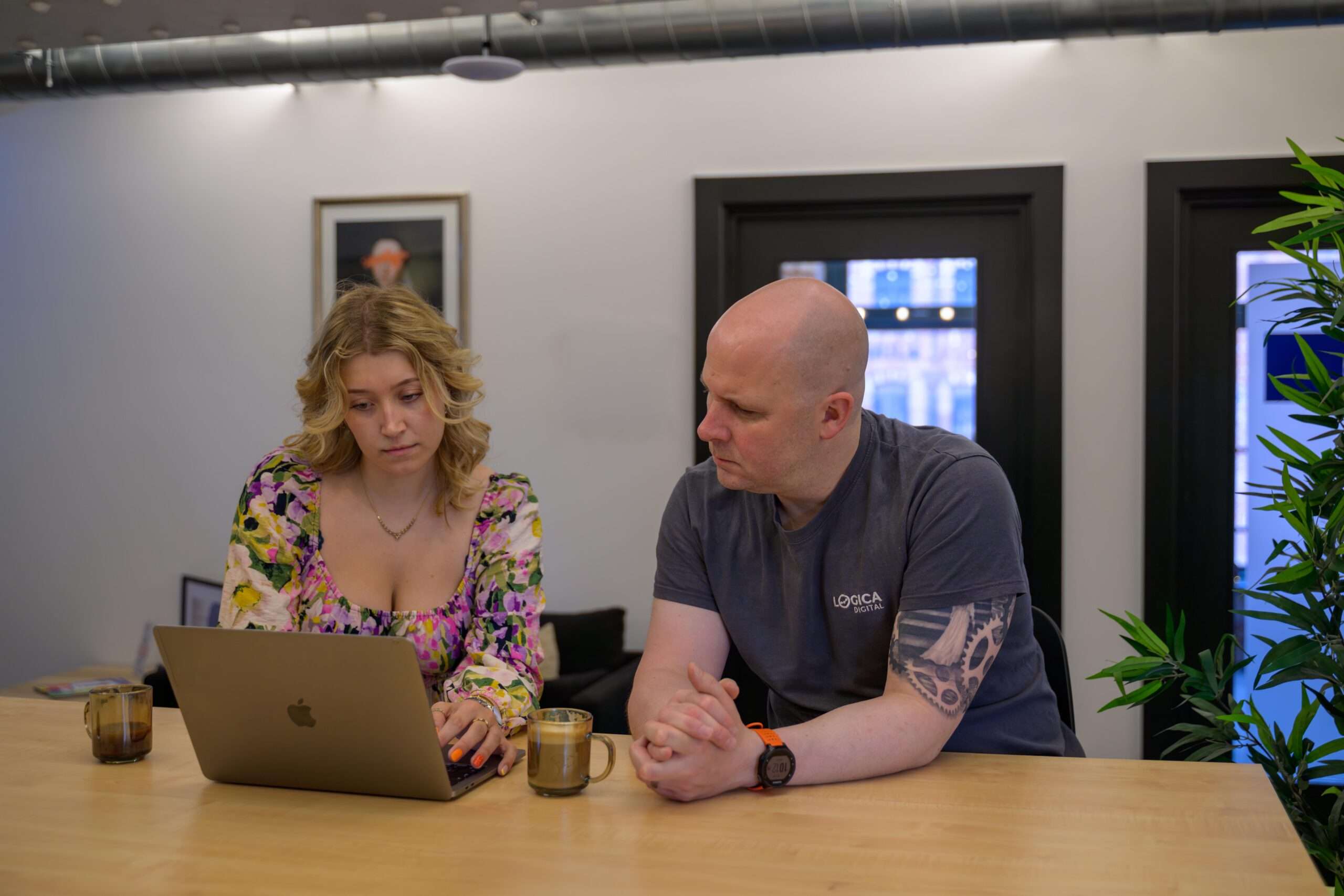 Logica Team in their communal office space
